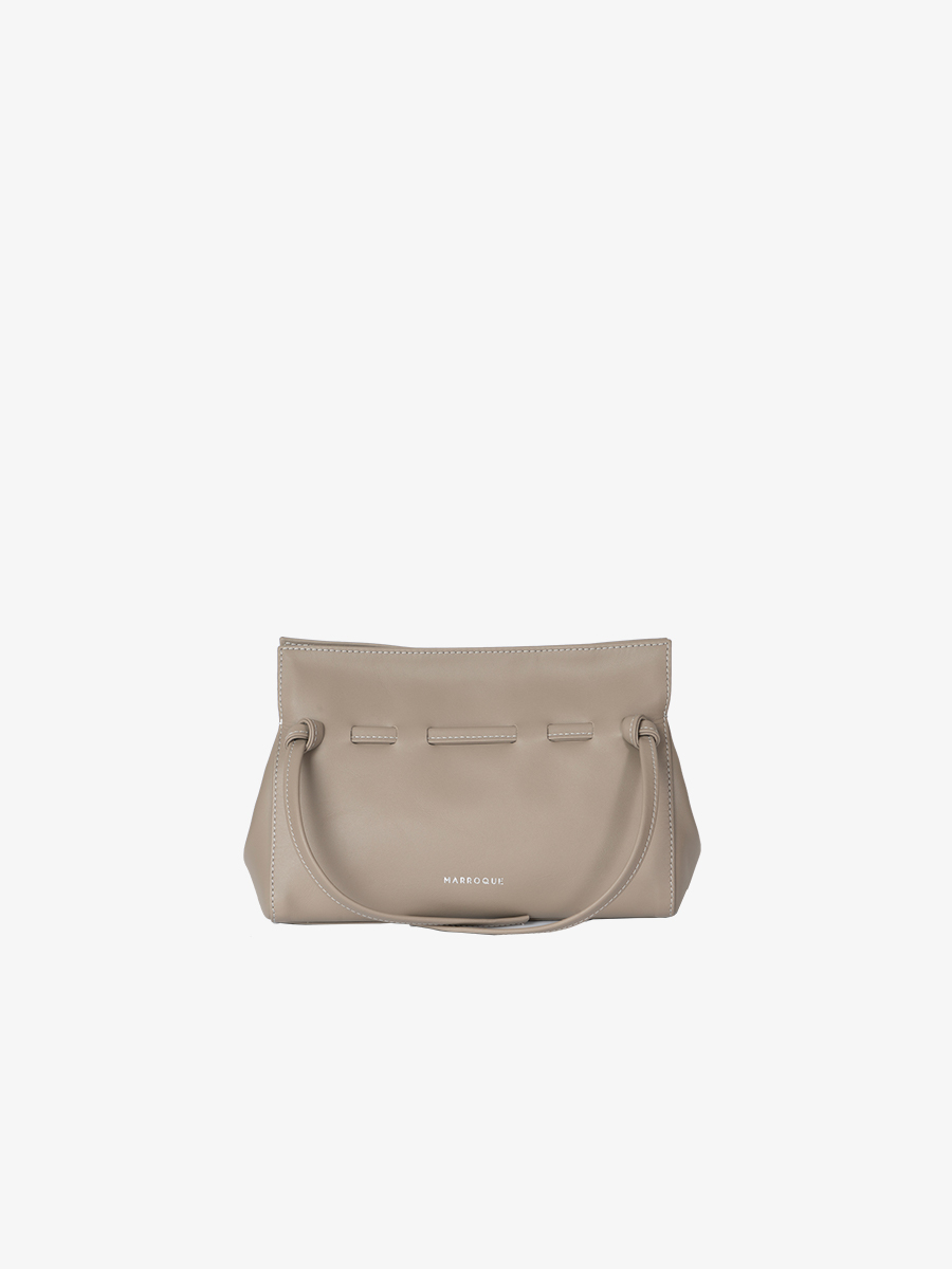 marroque mini wendy in taupe with model . leather bag